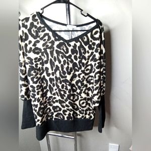 White and black leopard print top